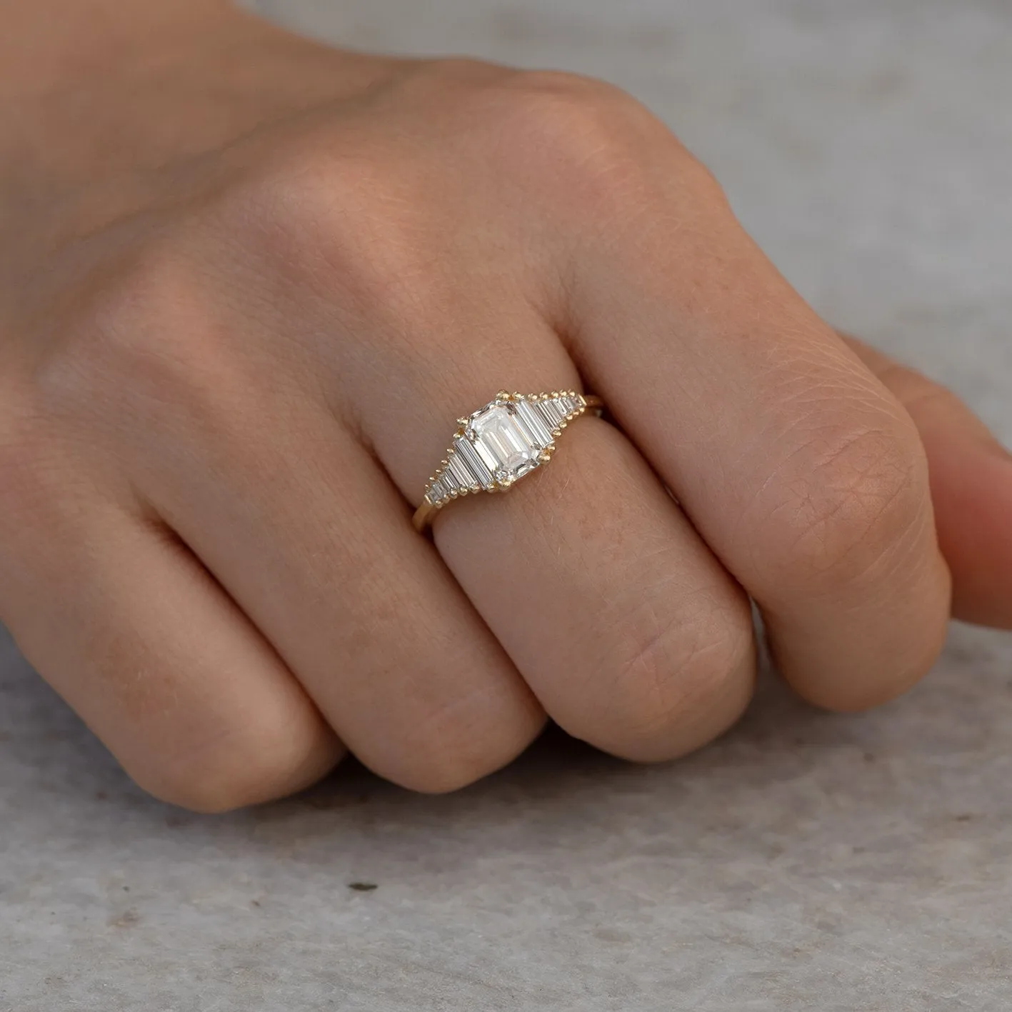 Classic Emerald Cut Engagement Ring with Tapered Needle Baguette Diamonds