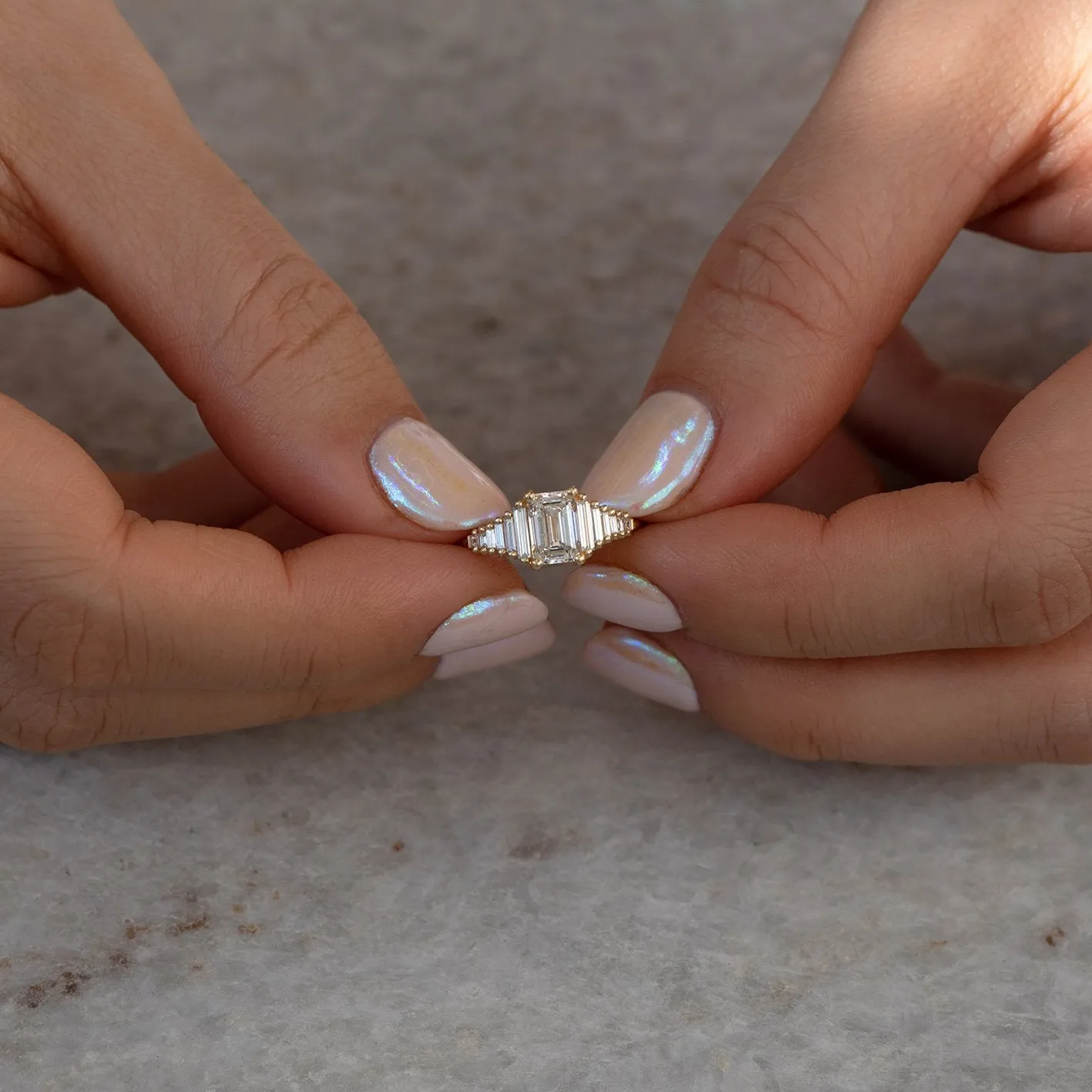 Classic Emerald Cut Engagement Ring with Tapered Needle Baguette Diamonds