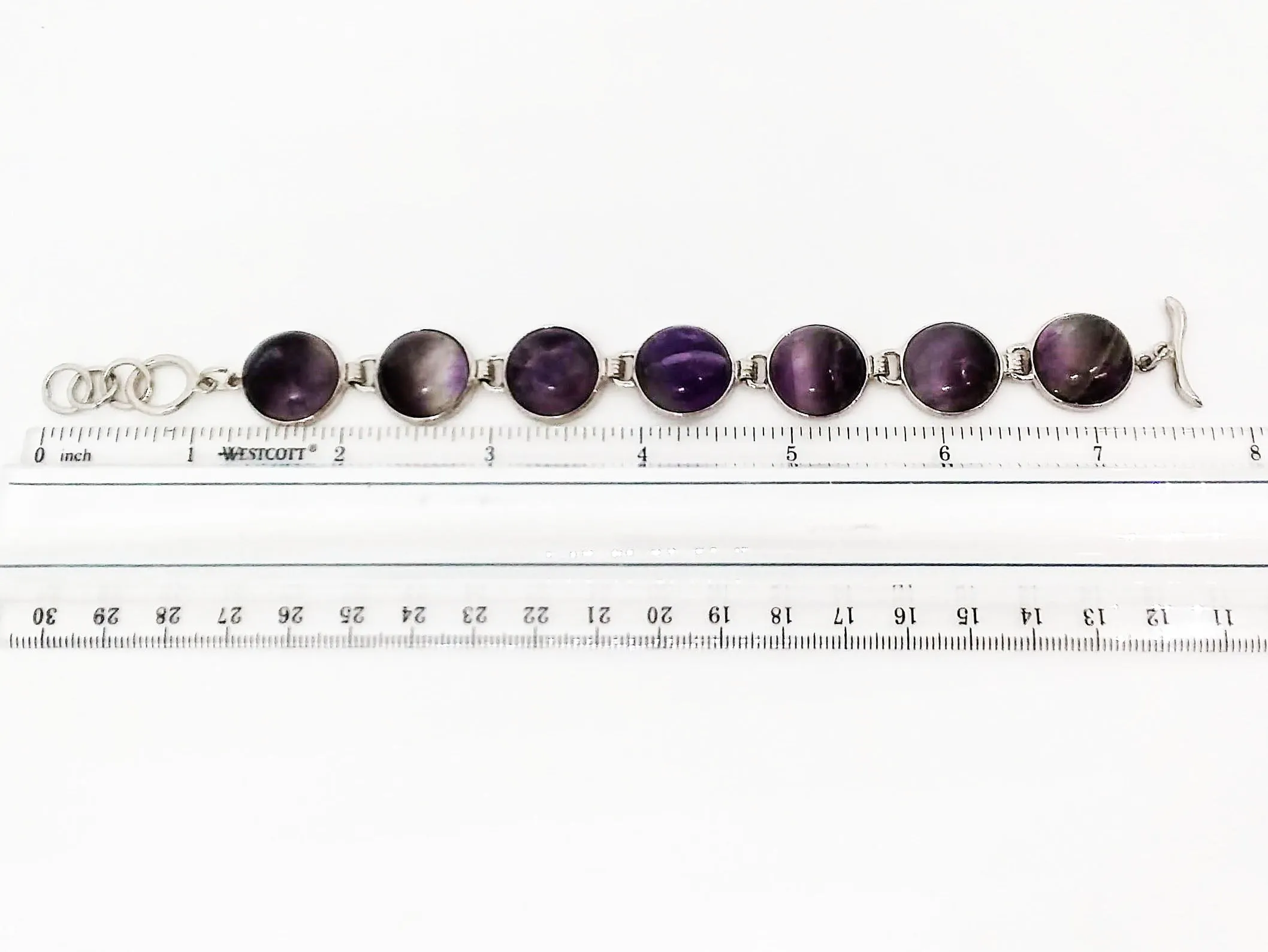 Gemstone Bracelet 7 Stone Amethyst Link Bracelet 7 3/4 length Brass Toggle Clasp Curvy